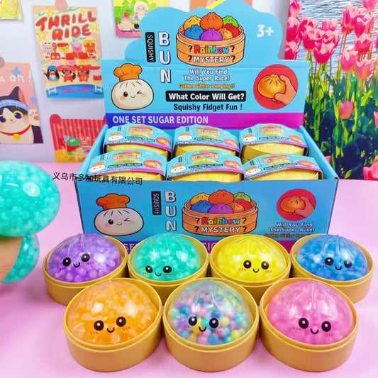 Squishy Dumpling con Carita “Pelotitas Glitter”