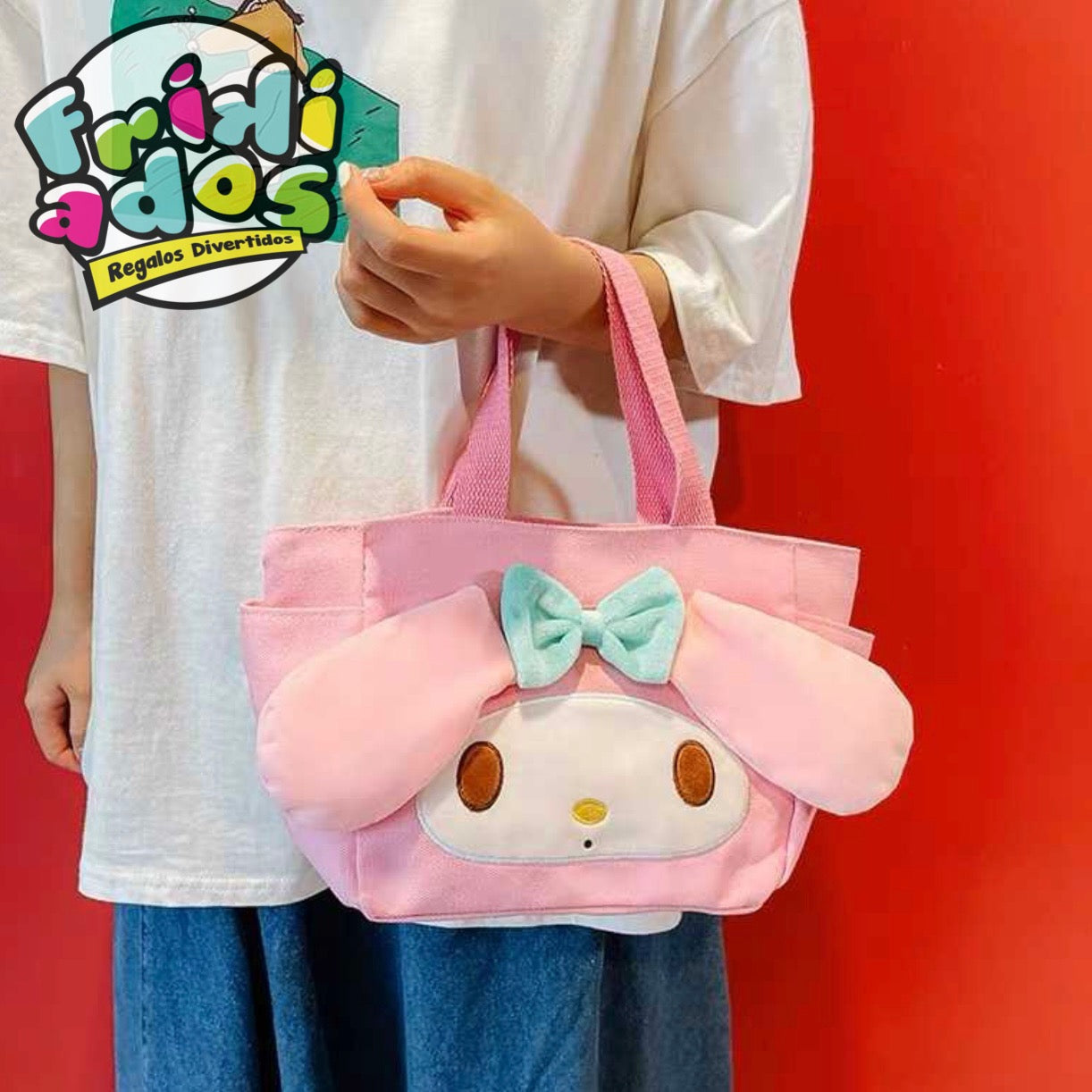 Mini Bolso “Sanrio”. Incluye tirante largo. 27x18x9Cms