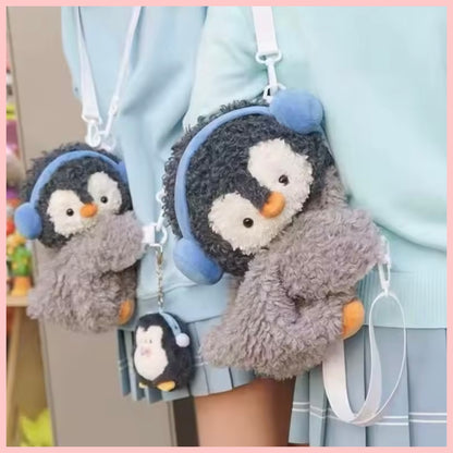 Cartera-Mochila “Pingüino Abrazos”. 25cms