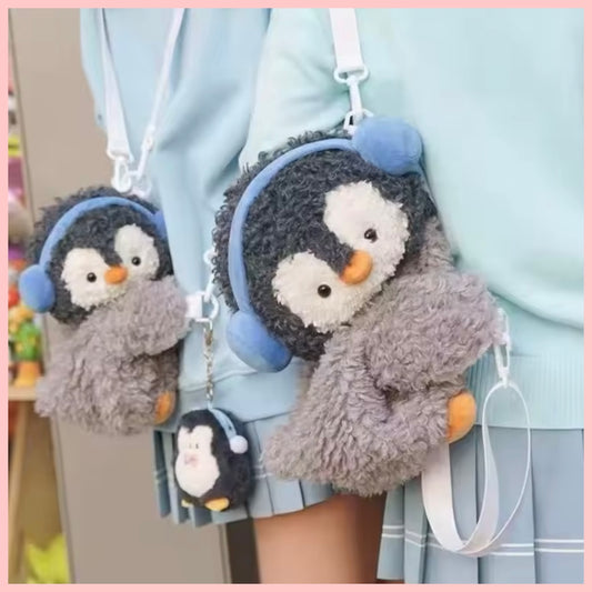 Cartera-Mochila “Pingüino Abrazos”. 25cms