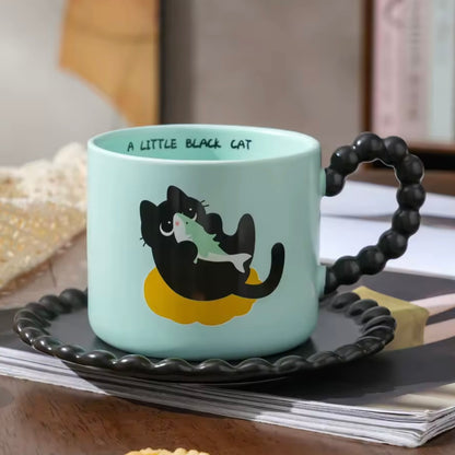 Taza “A Little Black Cat”. Material Cerámica. No incluye Plato.